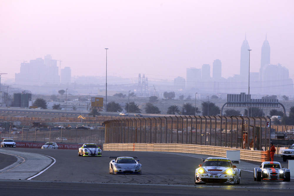 porsches racing at the dubai autodrome