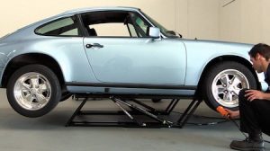 porsche on lift for pre purchase inspection ppi