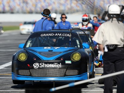 The TRG-Flying Lizard Porsche in the pits at Daytona
