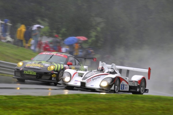 Muscle Milk Porsche racing in the rain in the ALMS Lime Rock
