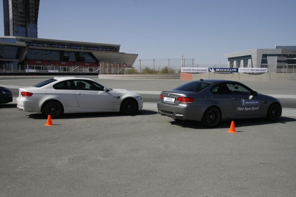 bmws lined up at dubai autodrome for michelin pilot super sport event