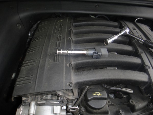 spark plugs in center of manifold on Porsche Cayenne