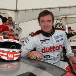 Craig Baird Leaning on Porsche Carrera Cup Car