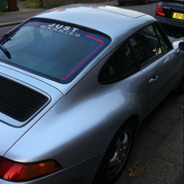 porsche 993 with a just married decal in rear window