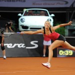 Maria Sharapova reaching for a shot at 2012 Porsche Tennis Grand Prix