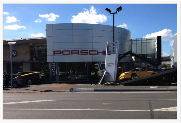 Truck Crashes Into a Porsche Dealership in Auckland New Zealand