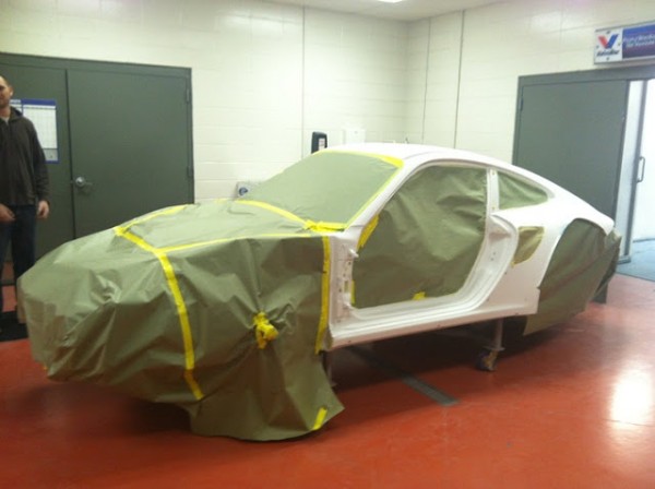 falken porsche taped and waiting for paint in the booth