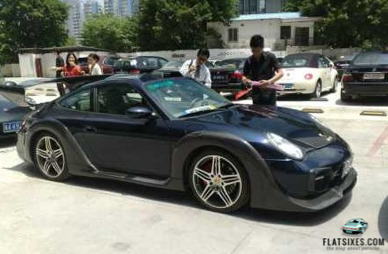 a really ugly aftermarket bodykit on a Porsche in China
