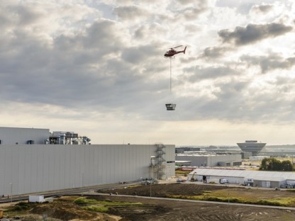 porsche completes paint shop construction with helicopter