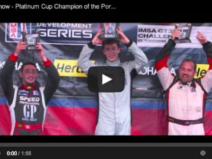 madison snow holding trophy over head after winning Porsche IMSA GT3 Cup Challenge