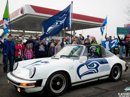Porsche 911 wrapped in seattle seahawks color