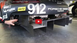 Kevin Estre giving a video tech tour of the mid engined Porsche 911 RSR