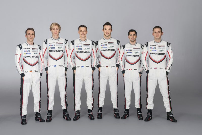 Porsche's complete LMP1 919 Factory driver line-up standing together in racing suits for a press photo