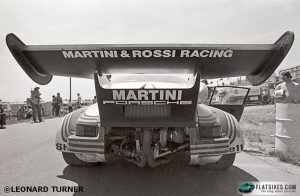 rear view of a Porsche Turbo Carrera RSR showing it's massive whale tale during a race at Watkins Glen 1974