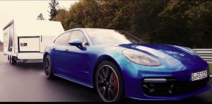 Porsche Panamera towing a trailer on the Nurburgring
