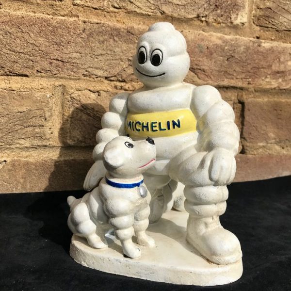 the michelin man, Bib, with his dog. 