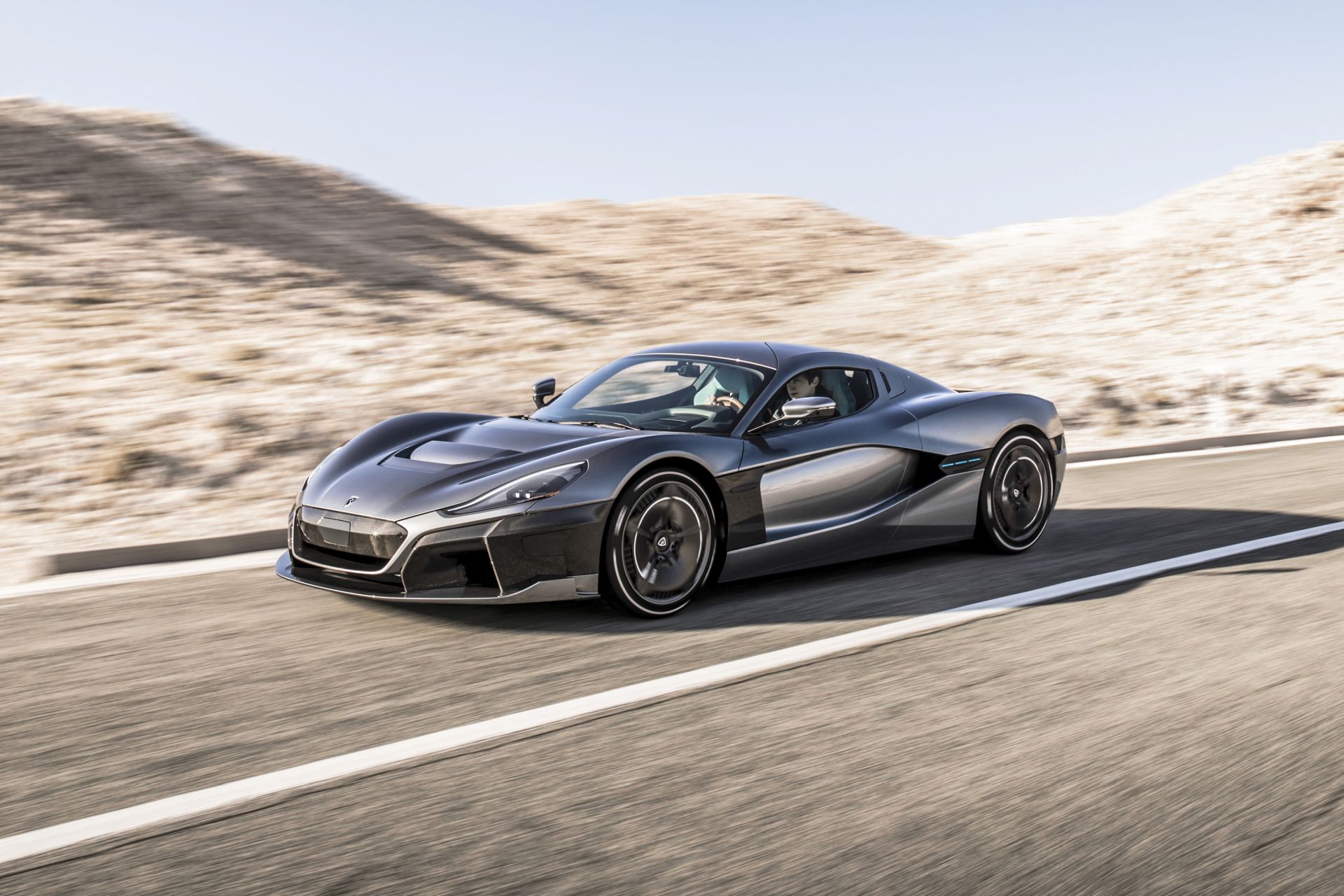 photo of Porsche Is Working A Deal To Trade Bugatti For Part Of Electric Hypercar Maker Rimac image